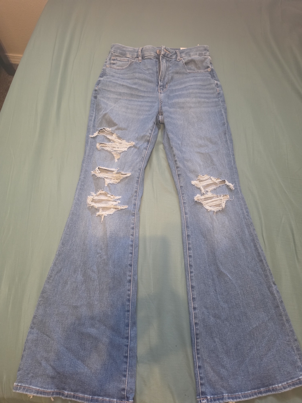Light Blue Distressed Flare Jeans - Women's